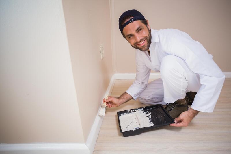 professional painter doing interior painting 